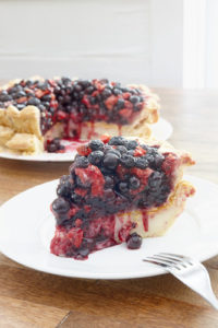 The result: strawberry-blueberry-thyme pie atop Hoosier sugar pie. Photo Credit: Alex di Suvero for The New York Times