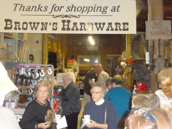 Townspeople linger around the pot of Brunswick stew at Brown’s Hardware.