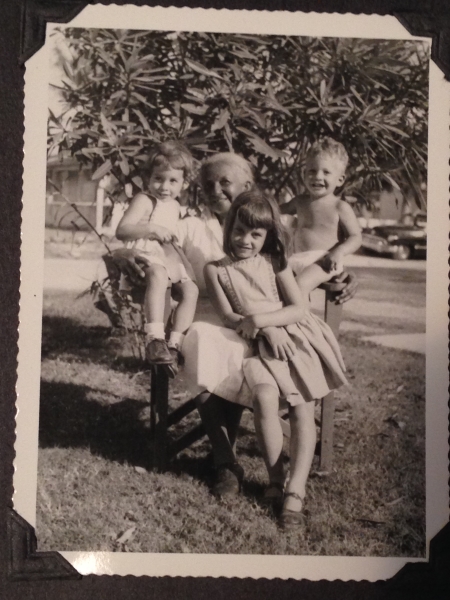 Juaquina González, who worked as cook in the author's family home in Havana. The children, from left to right, are Cristina, Cecilia, and Monty Freeman (the author's mother, aunt, and uncle, respectively). Havana, 1954. 