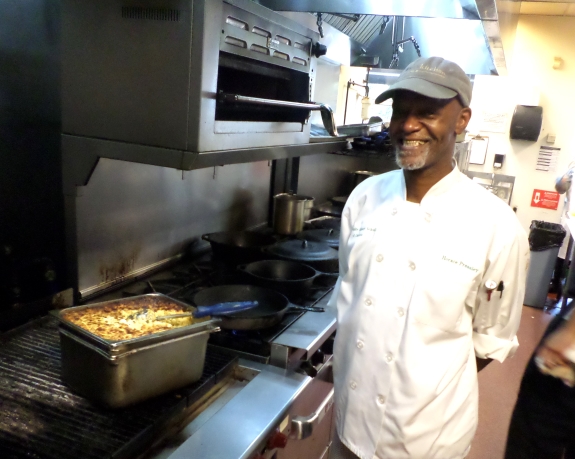Chef-in-training Horace Pressley spreads a big smile when someone raves about his mac and cheese.
