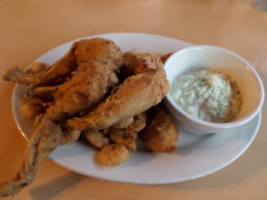 Frog legs and fried shrimp with cole slaw is a popular platter at Holland’s. (Ray Linville) 
