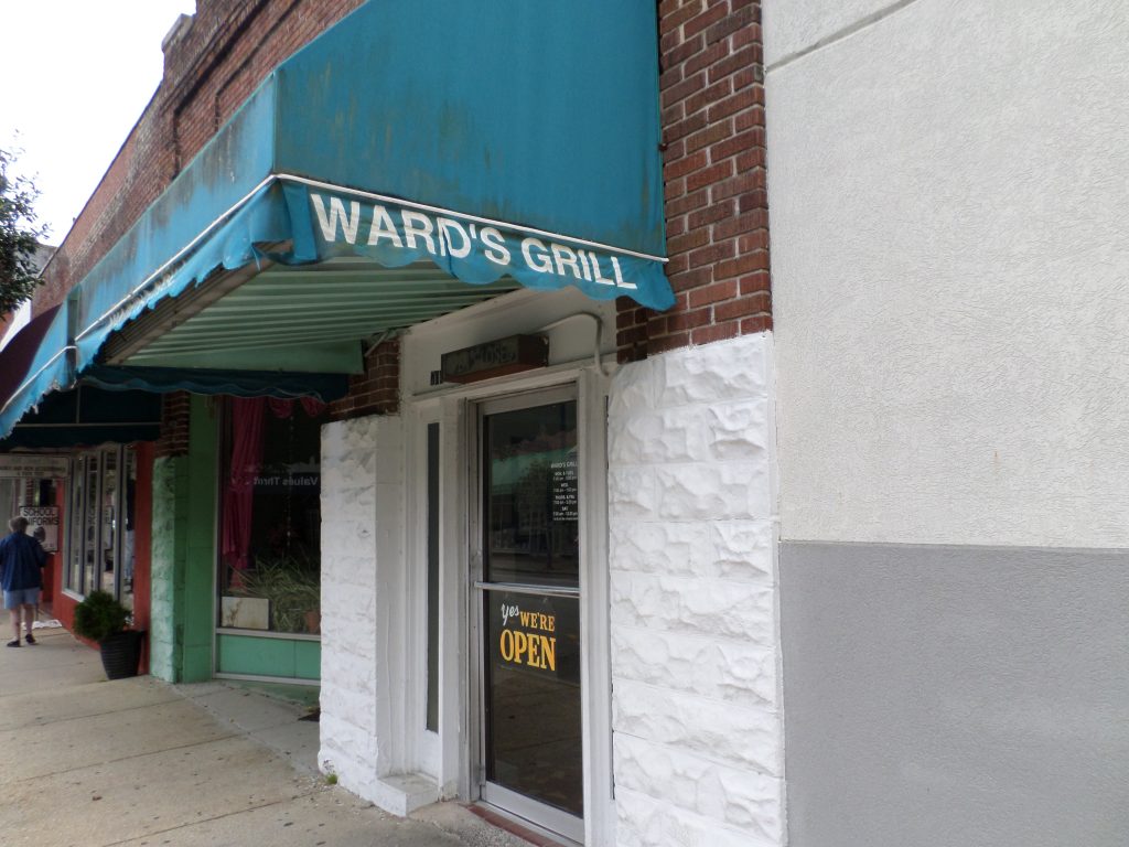 The front of Ward’s Grill, where usually a line of customers stretches onto the sidewalk, shows how narrow it is.