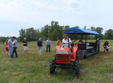 Tour visitors are driven around the farm by Jennifer, daughter of the current owner.