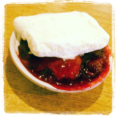 Cherry cobbler with vanilla ice cream.