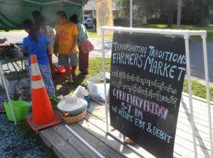 Although open only two hours each week, the farmers’ market operated by the Karen refugees teaches valuable entrepreneurial skills as well as provides fresh produce to supportive customers.