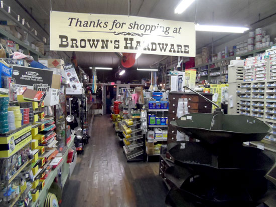 The front of Brown’s Hardware is completely empty as everyone gathers at the back where Brunswick stew is served.
