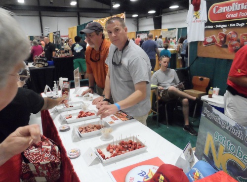 The line to sample red hot dogs was l-l-l-l-long.