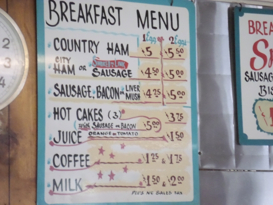Ham, bacon, and sausage are popular at breakfast but don’t overlook livermush on the menu board.