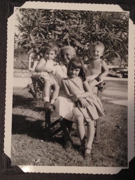 Juaquina González, who worked as cook in the author's family home in Havana. The children, from left to right, are Cristina, Cecilia, and Monty Freeman (the author's mother, aunt, and uncle, respectively). Havana, 1954.