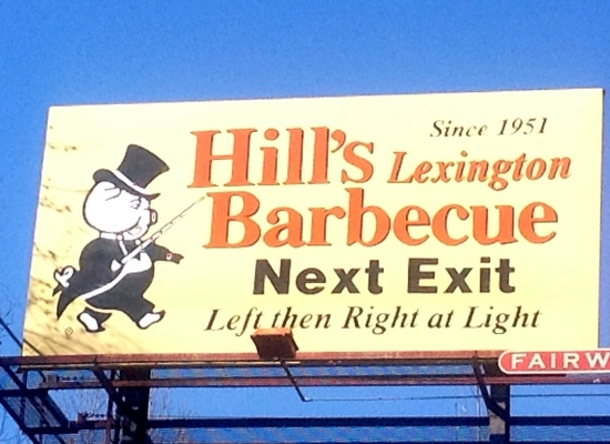 A high billboard helps new customers know which exit to take to find Hill’s.