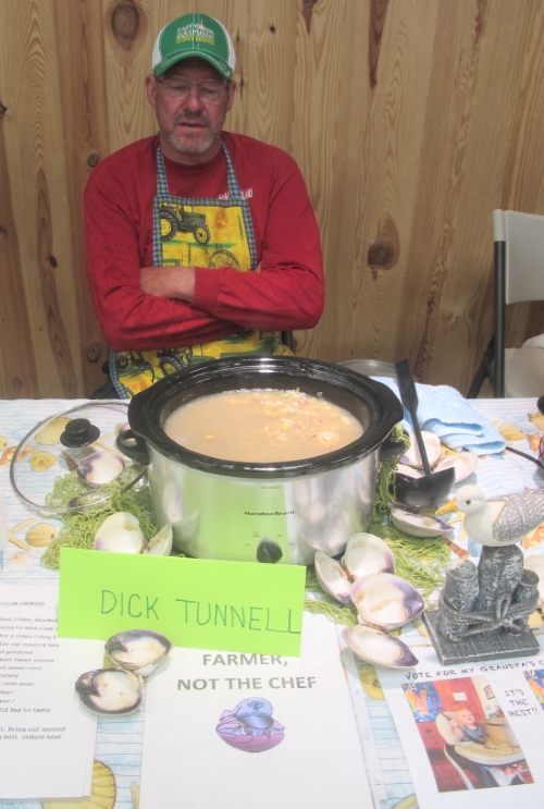 Dick Tunnel of Swan Quarter: His display included netting, shells, and pictures of his islander grandson (lower right) in a high chair promoting “Vote for my grandpa’s chowder. It’s the best.” Photo: Leanne E. Smith, 4-4-2015.