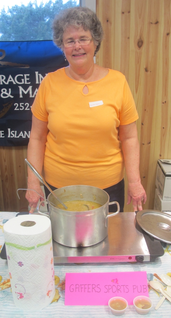 Ruth Toth (above) suggested the idea of a chowder cook-off.  She and other event volunteers temporarily helped serve the Gaffer’s Sports Pub chowder entry.  Photo: Leanne E. Smith, 4-4-2015.  