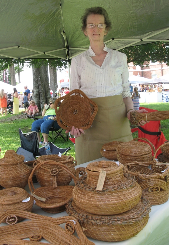 Margaret Raby with pine needle baskets.  Saturday, June 20, 2015.  Photo: Leanne E. Smith.