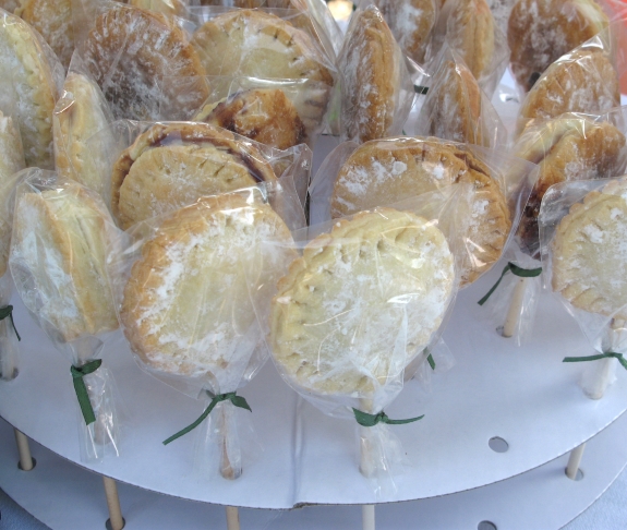 Blueberry pie pops at the Merging in Christ Youth Camp booth. Saturday, June 20, 2015. Photo: Leanne E. Smith.