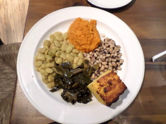 The four Southern vegetables -- butter beans, sweet potato mash, black-eyed peas, and collard greens – with cornbread on my plate were true home cookin’.