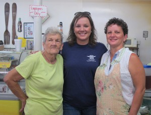 Three generations at the Grocery Basket: Margie (left), granddaughter Margo (center), daughter Susan (right). Monday, September 7, 2015. (Leanne E. Smith.)