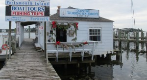 The Ocracoke Working Watermen’s Exhibit perched over Silver Lake at the Community Square. December 30, 2015. (Leanne E. Smith)