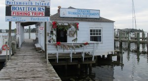 The Ocracoke Working Watermen’s Exhibit perched over Silver Lake at the Community Square.  December 30, 2015. (Leanne E. Smith)