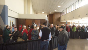 The waiting line makes five jackknife turns to stay inside the lobby of the Expo Center. (Ray Linville)