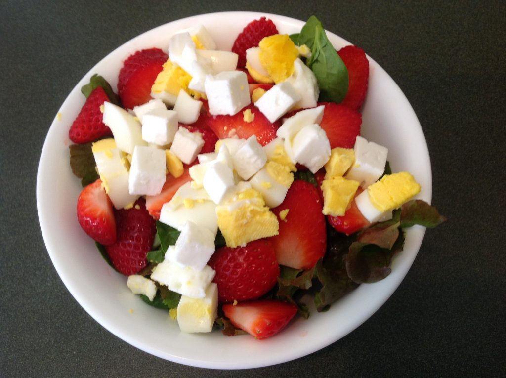 A salad that my wife made with cubes of goat cheese prominently displayed looks very inviting.