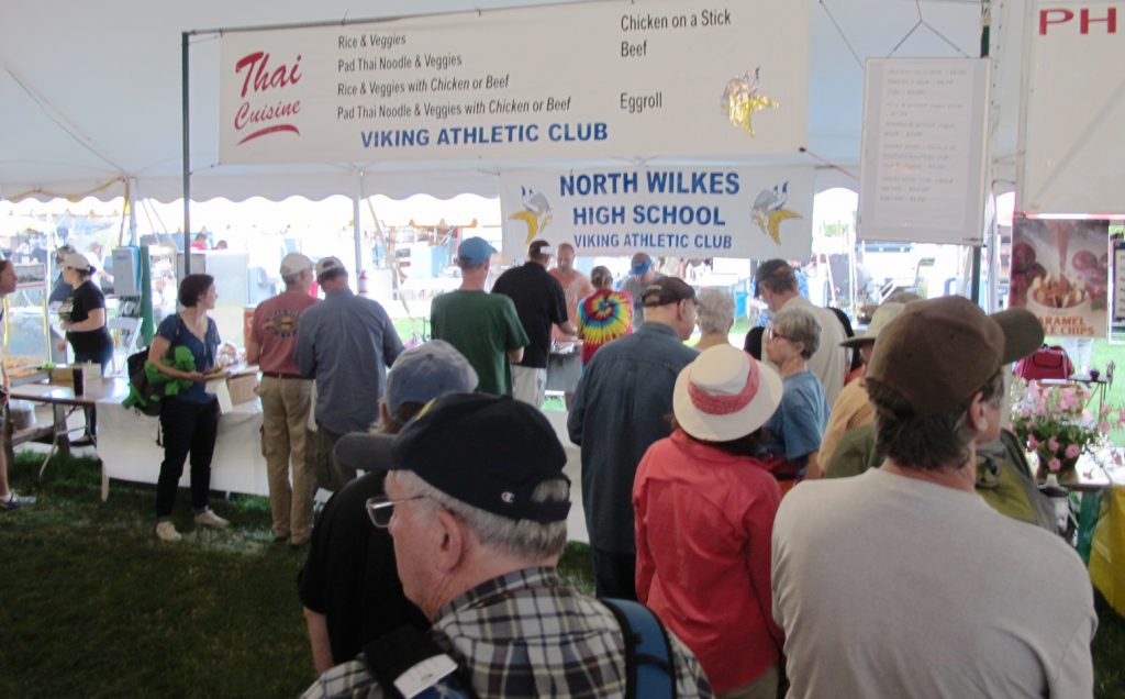 A line at the Viking Athletic Club booth.