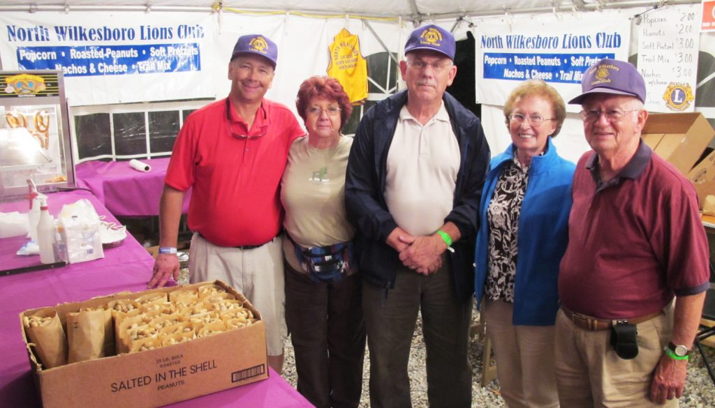 Volunteers at the North Wilkesboro Lions Club booth.