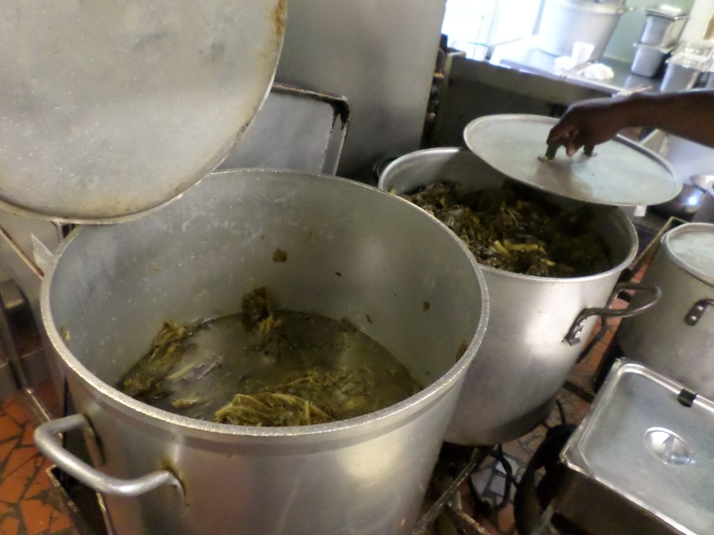 Huge pots of collards are cooked at Bum’s Restaurant daily.